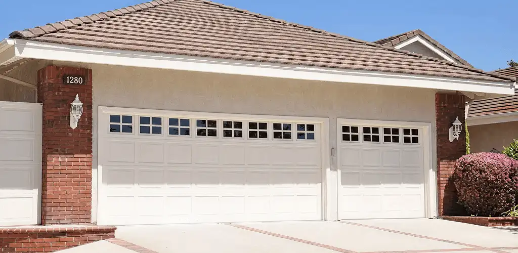 Residential garage door repair service for a double garage door in Norfolk, VA