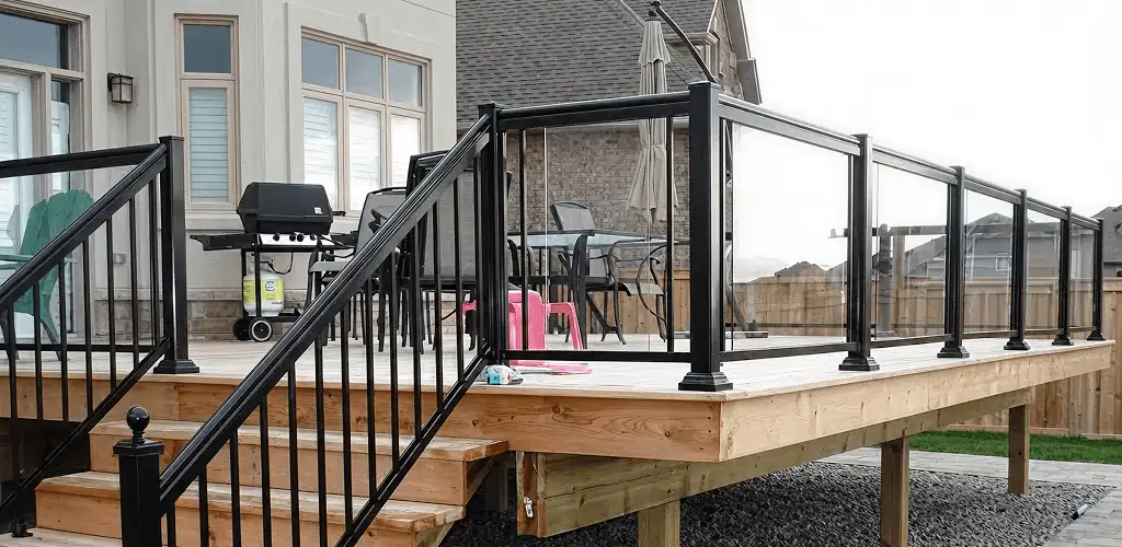 Handrail installation on a deck staircase for safety and code compliance in Norfolk, VA
