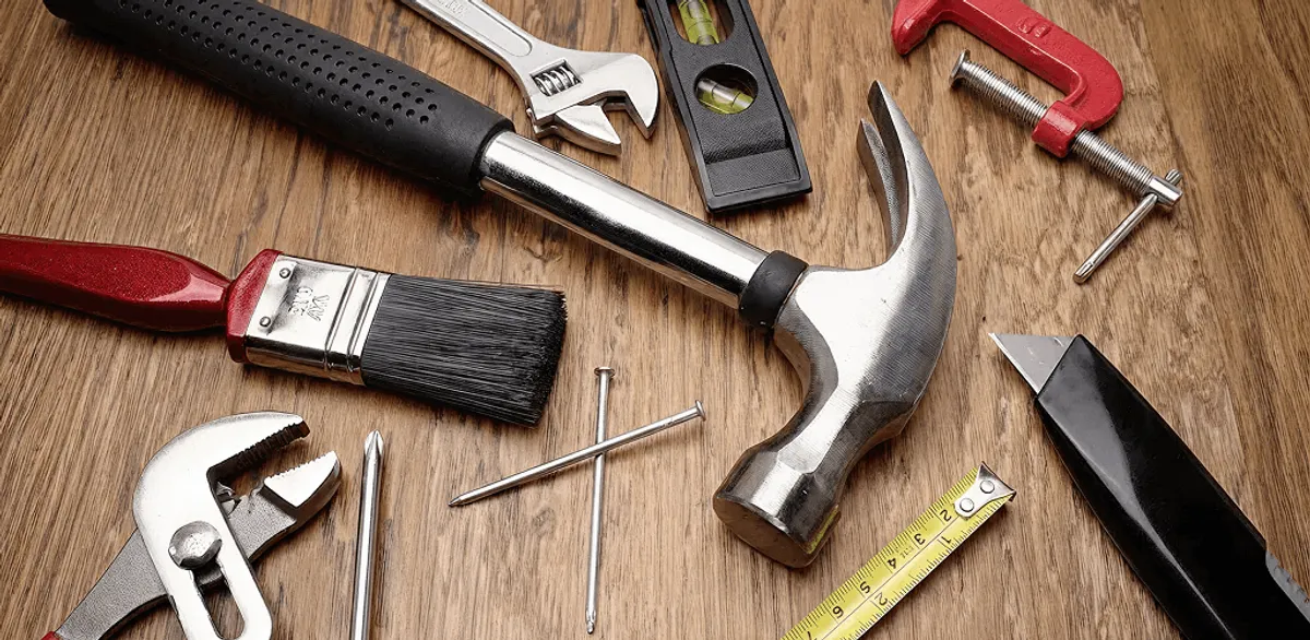 Handyman tools laid out for home repair and maintenance work in Norfolk, VA